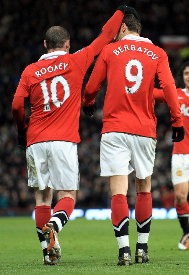 Rooney-Berbatov, Manchester United 2011. (Foto: ANDREW YATES / AFP)