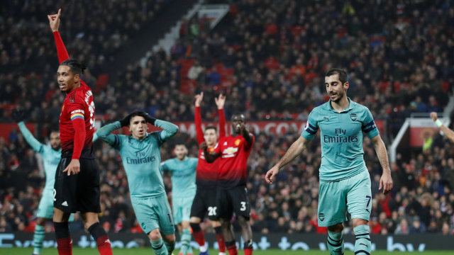 Manchester United vs Arsenal berakhir imbang. (Foto: Reuters/Carl Recine)