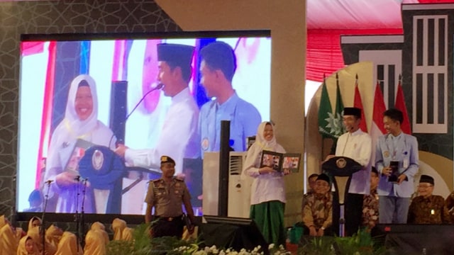 Presiden Jokowi hadir dalam dalam Resepsi Milad Satu Abad Madrasah Muallimin Mualimaat Muhammadiyah di Yogyakarta, Kamis (6/12).  (Foto: Arfiansyah Panji Purnandaru/Kumparan)