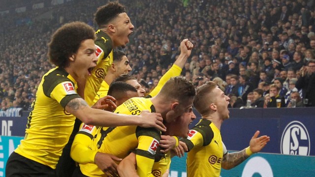 Para pemain Dortmund rayakan gol Delaney ke gawang Schalke. (Foto: REUTERS/Leon Kuegeler)