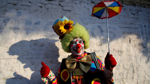 Seorang badut berpose dalam memperingati  International Clown Day di Guadalajara, Meksiko. (Foto: AFP/Ulises Ruiz)
