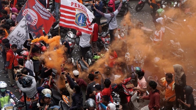 Suasana pawai Persija bersama dengan para suporter, The Jakmania, di Jakarta. Foto: Jamal Ramadhan/kumparan