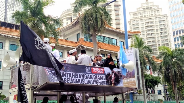 Jhonru Ginting di aksi bela Muslim Uighur. (Foto: Adhim Mugni Mubaroq/kumparan)