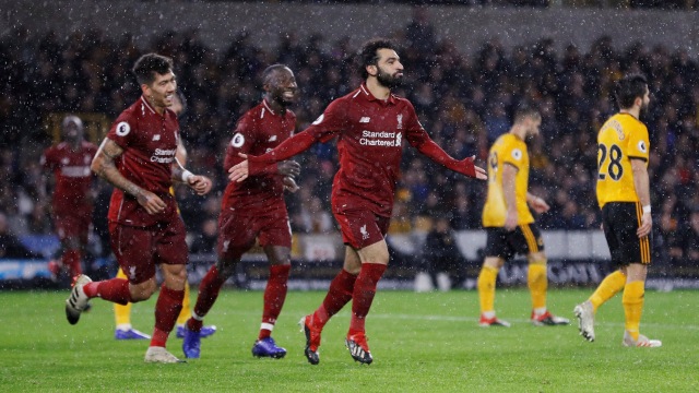 Mohamed Salah merayakan gol ke gawang Wolverhampton. (Foto: REUTERS/Darren Staples)