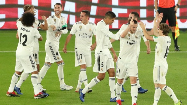 Para pemain Madrid merayakan gol. (Foto: REUTERS/Ahmed Jadallah)