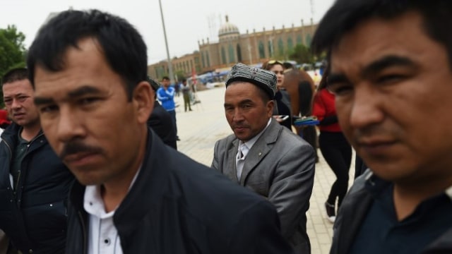 Warga Uighur di Xinjiang, China (Foto: AFP/Greg Baker)