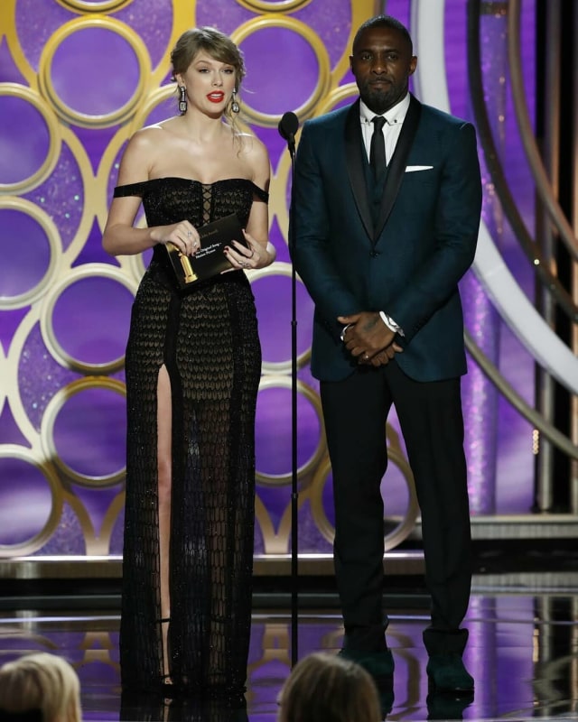Busana Terbaik Pria di Golden Globes 2019: Idris Elba. (Foto: Instagram @sasha.loves.taylor)