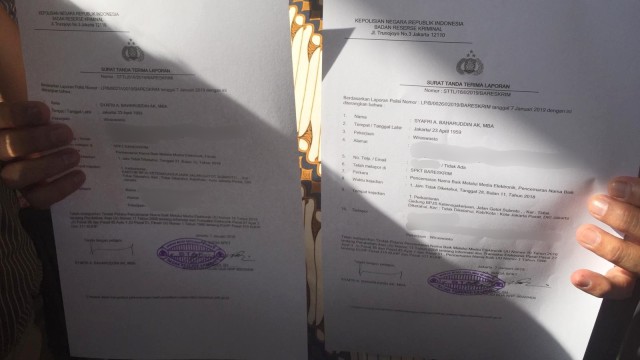 Surat pelaporan Eks petinggi BPJS TK Syafri Adnan Baharuddin usai laporkan Ade Armando dan kliennya ke Bareskrim Polri.  (Foto: Lutfan Darmawan/kumparan)