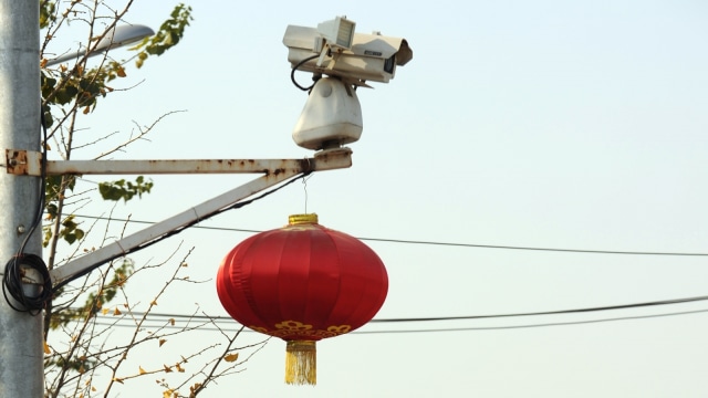 Kamera CCTV di China. (Foto: AFP/PETER PARKS )