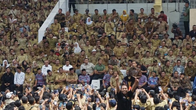 Presiden Jokowi temui ribuan perangkat Desa di Istora Senayan, Jakarta. (Foto: Yudhistira Amran Saleh/kumparan)