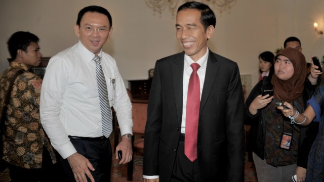 Presiden Indonesia terpilih Joko Widodo (ketiga dari kiri) bertemu Wakil Gubernur Basuki Tjahaja Purnama (kedua dari kiri) di Jakarta (23/7/2014). Foto: AFP/BAY ISMOYO