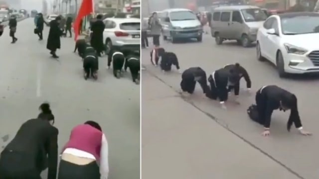 Pekerja di China dipaksa merangkak di jalanan. (Foto: Dok. Youtube)