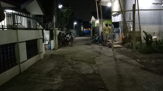 Kondisi jalan Haji Kirinkeman yang disebut sebagai lokasi kantor majalah Indonesia Barokah. (Foto: Nadia Riso/kumparan)