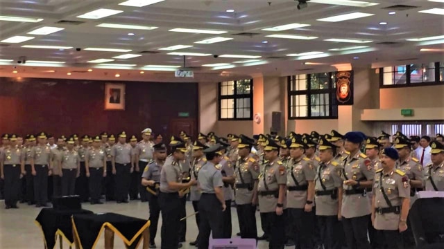 Suasana saat Kapolri Tito Karnavian menaikkan pangkat Idham Azis menjadi Komisari Jenderal (Komjen) Polisi. (Foto: Mirsan Simamora/kumparan)