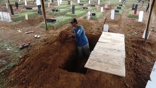 Ilustrasi pemakaman. Foto: Irfan Adi Saputra/kumparan