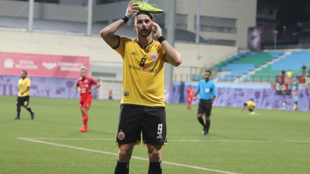 Striker Persija Jakarta, Marko Simic, melakukan selebrasi usai mencetak gol ke gawang Home United. Foto: Dok. Persija Jakarta