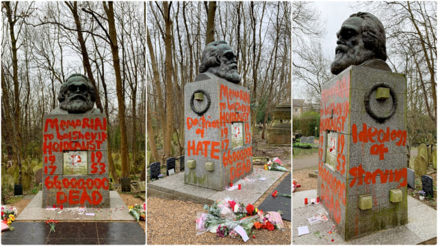 Makam Karl Marx yang dipenuhi coretan karena aksi vandalisme. Foto: Reuters