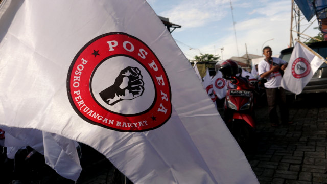 Relawan pendukung Jokowi yang tergabung dalam Pospera (Posko Perjuangan Rakyat) mengadakan konvoi ke lokasi debat capres, di Hotel Sultan. Foto: Iqbal Firdaus/kumparan