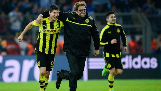 Robert Lewandowski bersama Juergen Klopp di Borussia Dortmund. Foto: JOHN MACDOUGALL / AFP