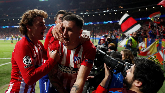 Para pemain Atletico Madrid merayakan gol. Foto: REUTERS/Sergio Perez