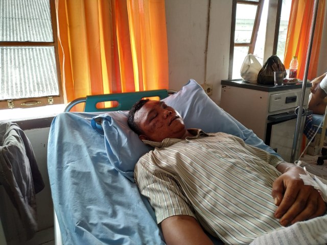 Harismail yang menjadi korban salah tangkap oknum polisi menjalani perawatan di RS Bhayangkara. (foto: Urban Id)