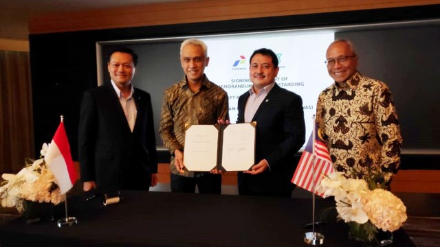 Pertamina dan Petronas sepakati sinergi bisnis. Foto: Dok. Pertamina
