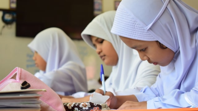 Ilustrasi kegiatan belajar mengajar di Madrasah Ibtidaiyah Foto: Shutterstock