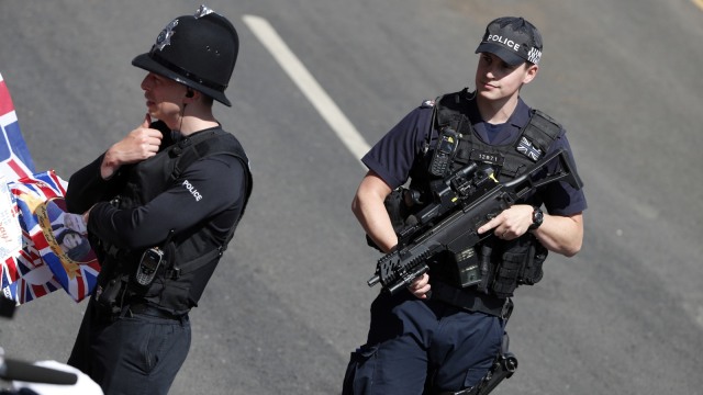 Ilustrasi Polisi Inggris. Foto: AFP/Adrian DENNIS