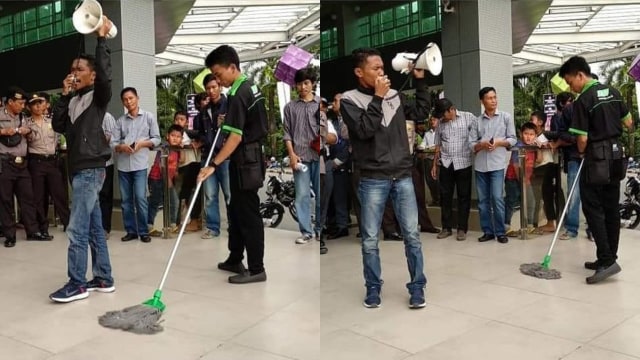 Petugas kebersihan saat aksi protes film Dilan 1991 ini jadi perhatian. (foto: Instagram/@makassar_iinfo)