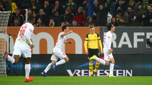 Dong-Won Ji merayakan golnya ke gawang Dortmund. Foto: REUTERS/Michael Dalder