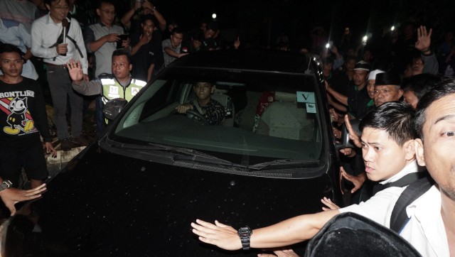 Pengawalan Siti Aisyah saat tiba di Kampung Halaman Foto: Helmi Afandi/kumparan