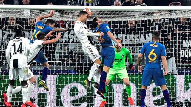 Gol Ronaldo ke gawang Atletico Madrid. Foto: REUTERS/Massimo Pinca