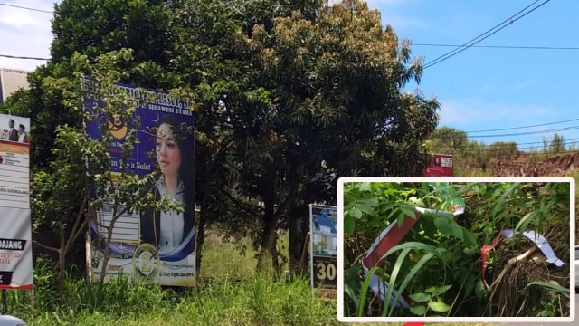 Lokasi baliho milik Caleg asal PKB di Kota Manado, Sulawesi Utara yang dirusak. Hal ini menjadi janggal karena hanya baliho tersebut yang dirusak. Inzet : Sisa-sisa material baliho milik Caleg PKB yang dirusak