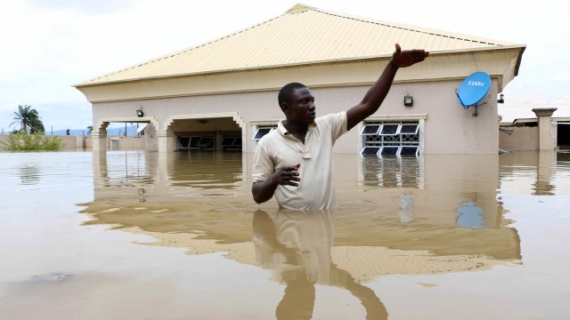 Ilustrasi banjir di Afrika. Foto: AFP/Sodiq ADELAKUN