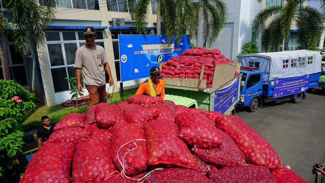 Serah terima barang bukti sebanyak 3.200 karung untuk dihibahkan di Kantor Pengawasan dan Pelayanan Bea dan Cukai (KPPBC) Tipe Madya Pabean C Kuala Langsa, Aceh. Foto: Zuhri Noviandi/kumparan