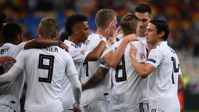 Pemain-pemain Timnas Jerman merayakan gol ke gawang Prancis. Foto: AFP/Franck Fife