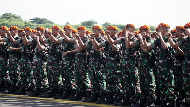 Suasana Apel gelar pasukan terpusat Bersama TNI, Polri, dan komponen masyarakat di Pangkalan TNI AU, Halim Perdanakusuma, Jakarta, Jumat (22/3). Foto: Jamal Ramadhan/kumparan