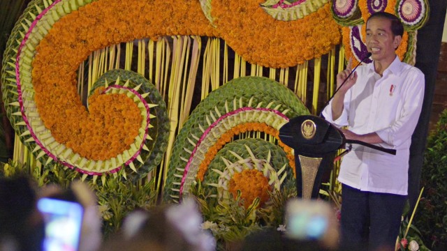 Presiden Joko Widodo menyampaikan sambutan saat kegiatan peresmian Pasar Badung di Denpasar, Bali. Foto: Antara/Fikri Yusuf