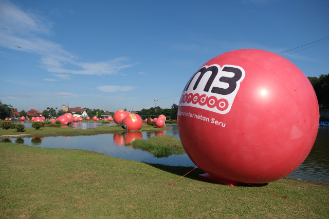 com-Bola merah raksasa IM3 Ooredoo