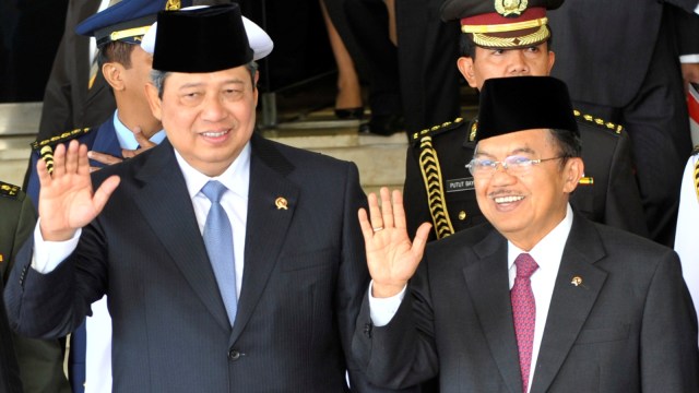 Presiden ke-6 Susilo Bambang Yudhoyono dan Wakil Presiden ke-10 Jusuf Kalla. Foto: AFP/Romeo Gacad