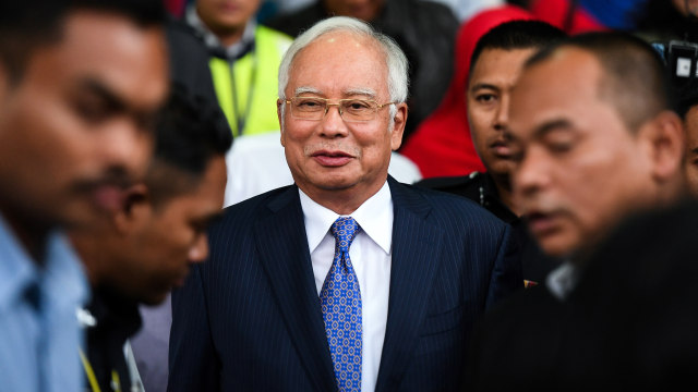 Eks PM malaysia, Najib Razak usai diadili di Pengadilan Kuala Lumpur karena kasus korupsi. Foto: AFP/MOHD RASFAN