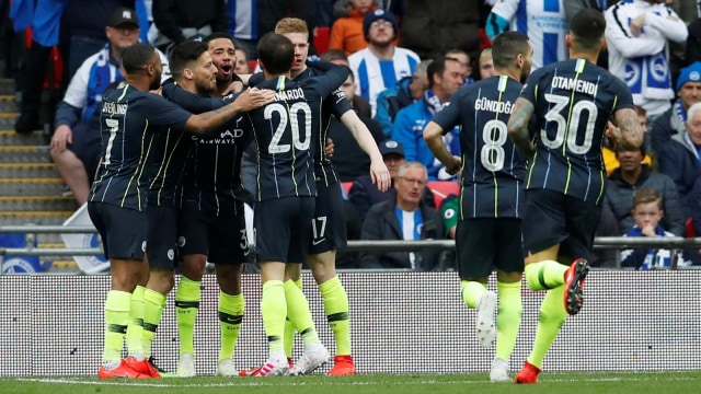 Para penggawa Manchester City merayakan gol ke gawang Brighton. Foto: Reuters/David Klein