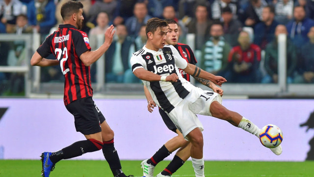 , Dybala sumbang satu gol ke gawang AC Milan. Foto: Reuters/Massimo Pinca