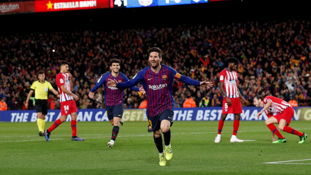 Messi merayakan gol ke gawang Atletico Madrid. Foto: REUTERS/Albert Gea