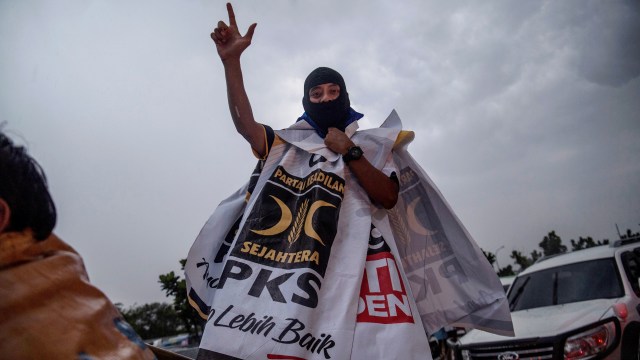 Simpatisan PKS mengikuti kampanye terbuka Calon Presiden nomor urut 02 Prabowo Subianto di kawasan Stadion Pakansari, Cibinong, Bogor, Jawa Barat, Jumat (29/3/2019). Foto: ANTARA FOTO/Sigid Kurniawan