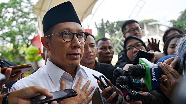 Menteri Agama Lukman Hakim Saifuddin tiba untuk menjalani pemeriksaan di kantor KPK, Jakarta, Rabu (8/5). Foto: Antara/Sigid Kurniawan