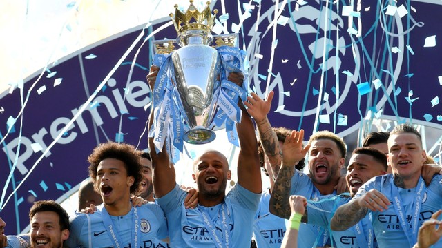 Para pemain Manchester City merayakan kemenangan menjadi juara Liga Premier. Foto: REUTERS/Toby Melville