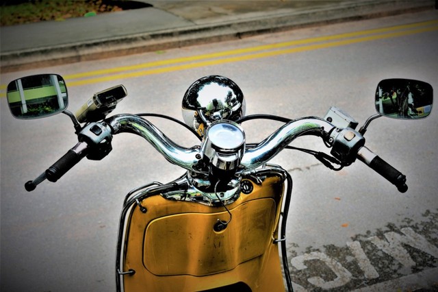 com-Ilustrasi vespa.