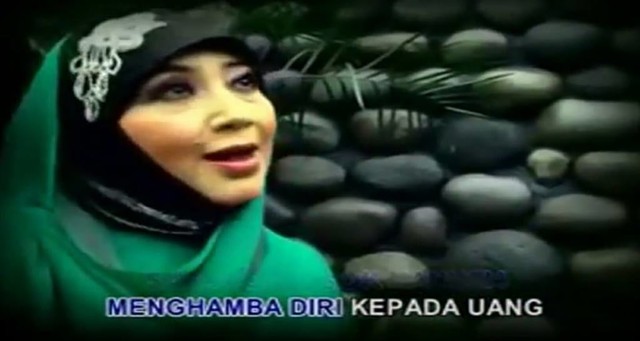 menghamba diri pada uang.jpg