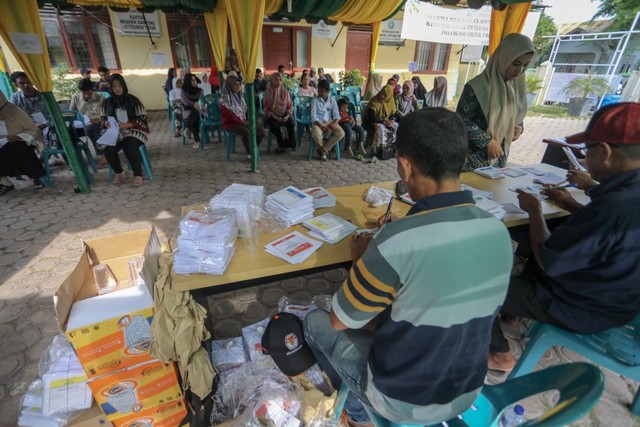 Ilustrasi. KPPS dan surat suara dalam Pemungutan Suara Ulang (PSU) di Banda Aceh. Foto: Suparta/aceghkini